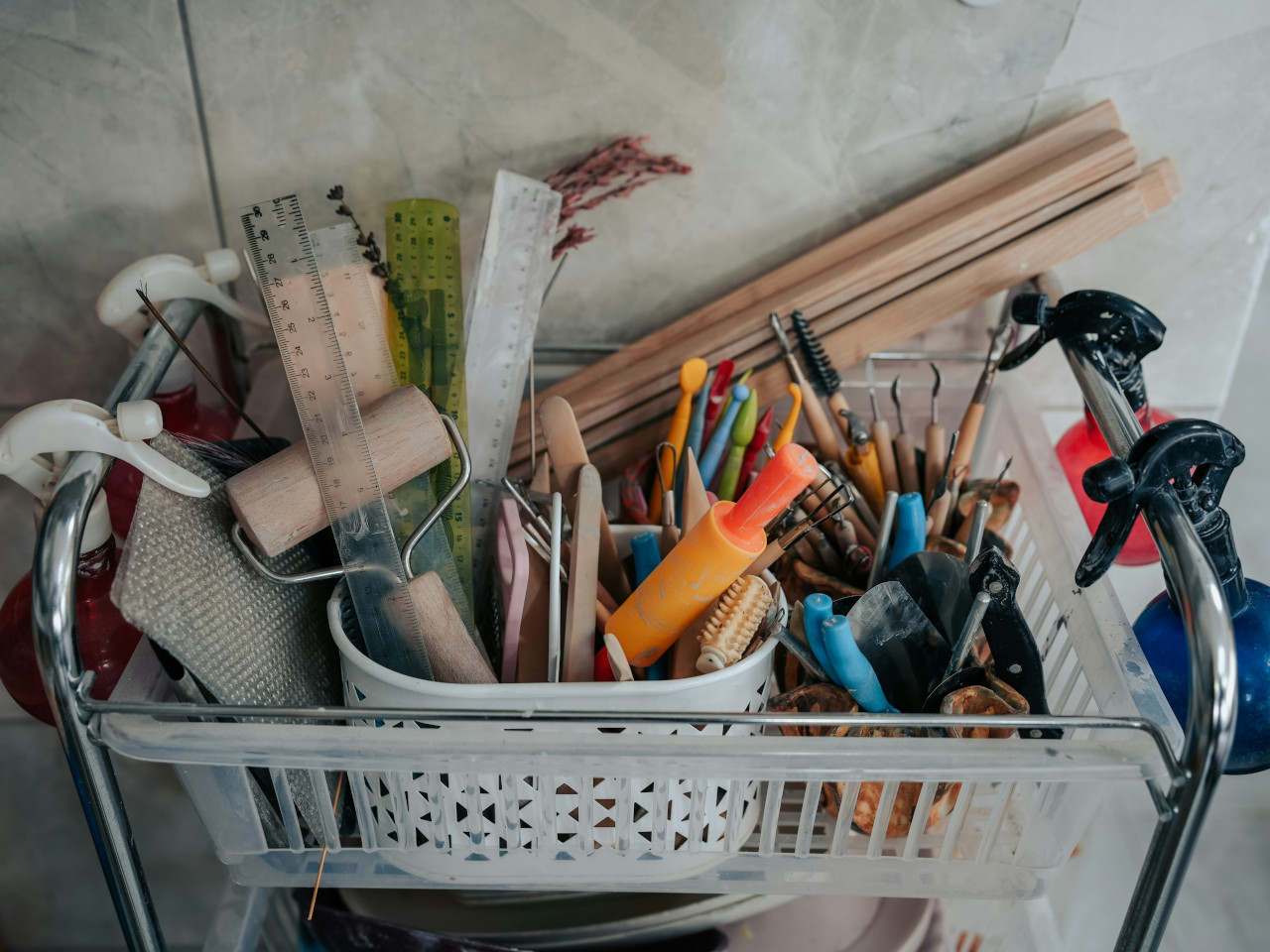 Photograph of a tray of tools organised by the task for which they are used.